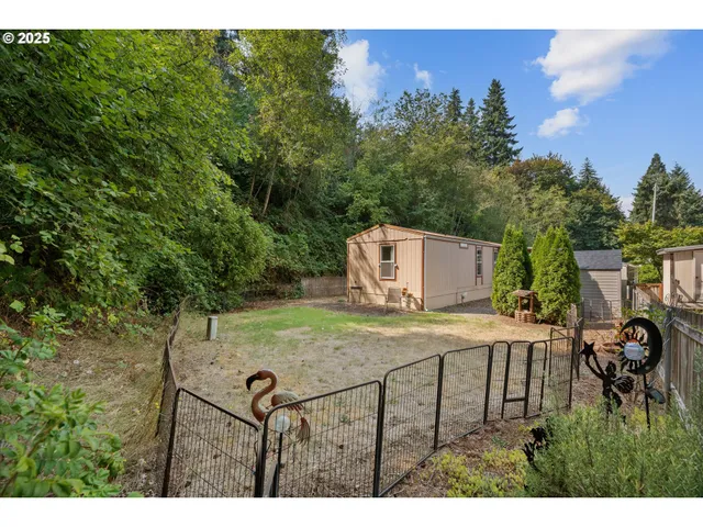 a view of a backyard with green space