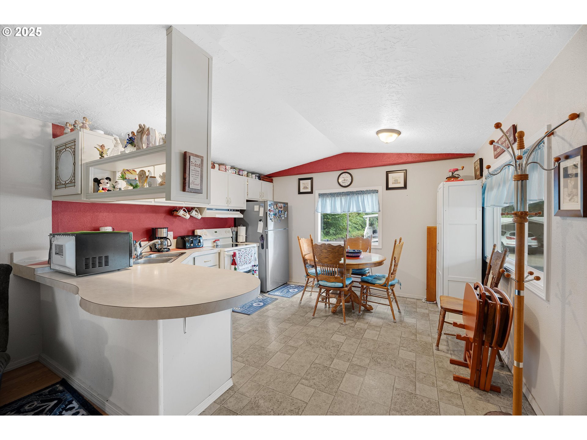 17655 Bluff Road, Unit 42 Sandy, OR 97055 - Photo 5 of 23 a dining room with furniture and a chandelier