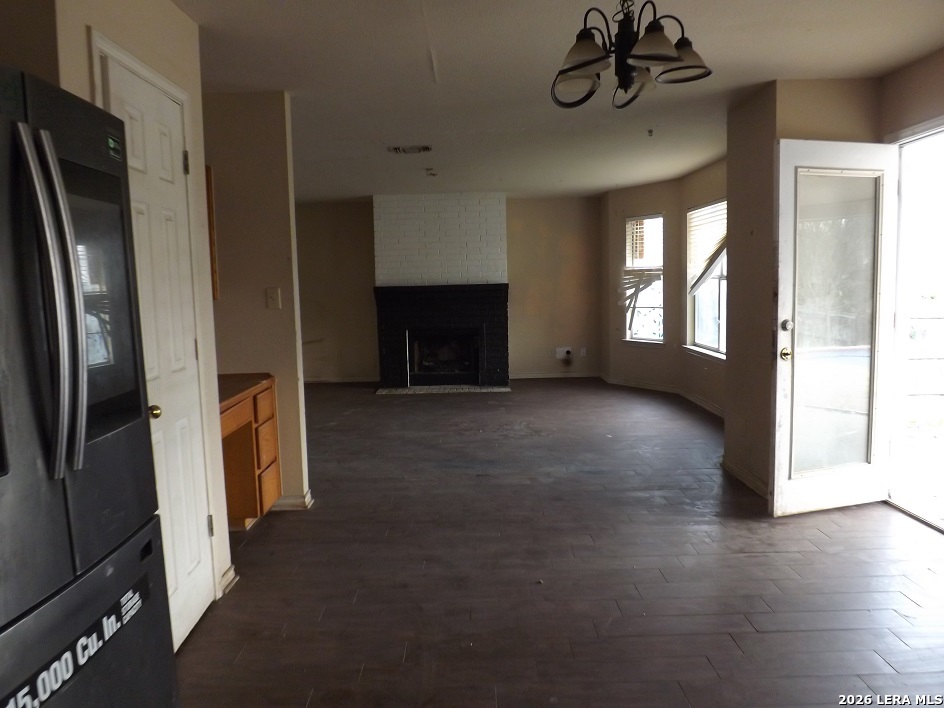 7110 Misty Ridge Drive Converse, TX 78109 - Photo 4 of 7 a view of a livingroom with a staircase
