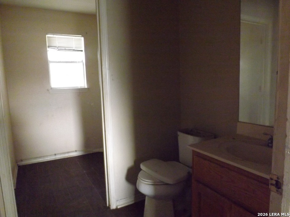 7110 Misty Ridge Drive Converse, TX 78109 - Photo 5 of 7 a bathroom with a toilet