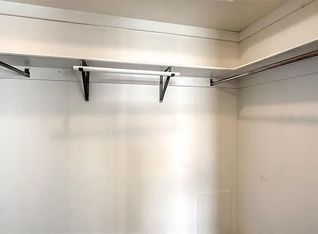 a view of a room with racks on the wall