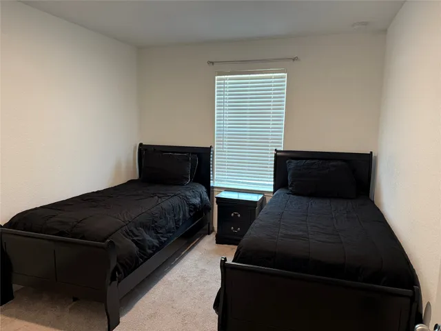 a bathroom with a sink a mirror and a vanity