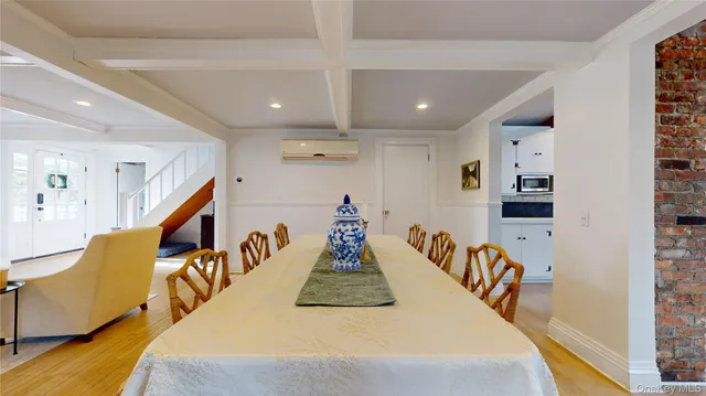 a room with furniture and stairs