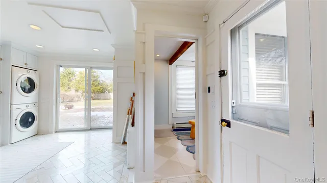 a bathroom with a glass door shower and bathroom
