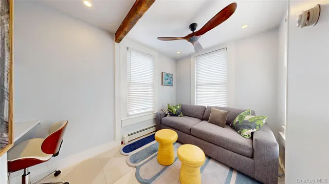 a living room with furniture and a window