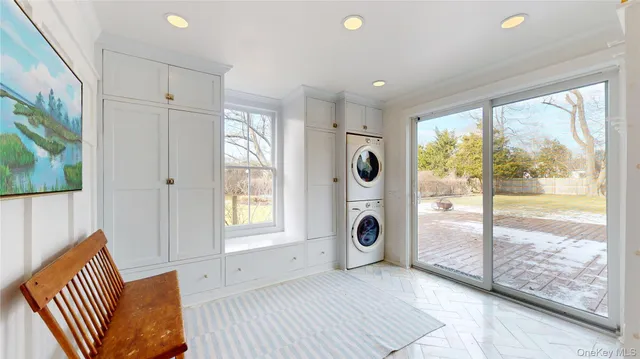 a view of a hallway with a sink and a fireplace