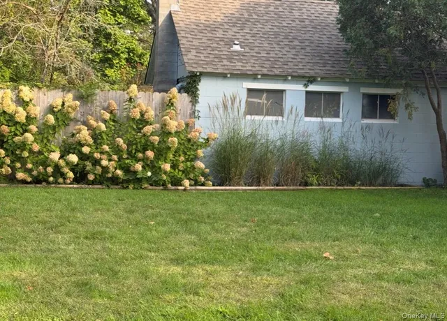 a view of a house with a garden