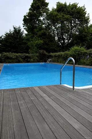 a view of a backyard of the house