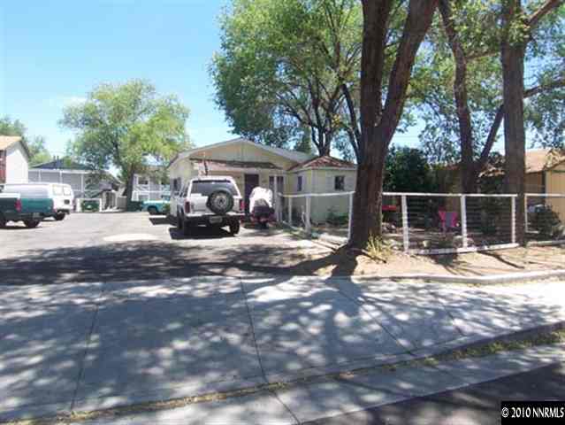 108 Chism Street Reno, NV 89503 - Photo 1 of 1 a house with trees in front of it