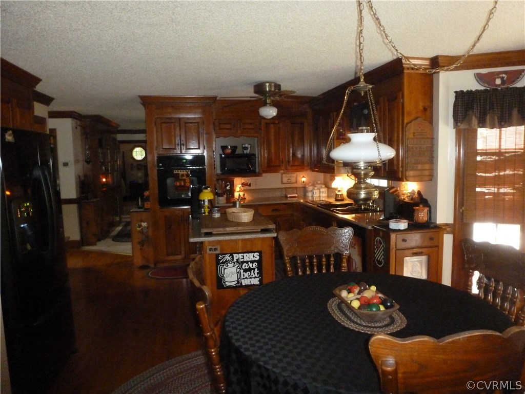 8725 Sandy Ridge Road Hopewell, VA 23860 - Photo 8 of 19 a living room with furniture and wooden floor