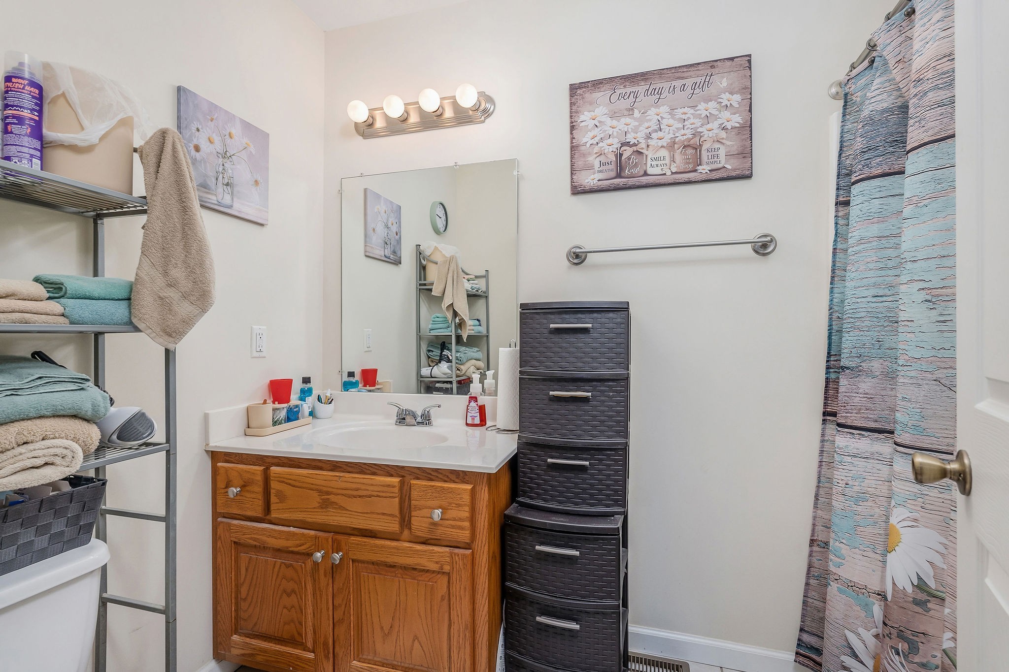 1565 Canada Flatt Road Cookeville, TN 38506 - Photo 11 of 28 a bedroom with a dresser and a mirror