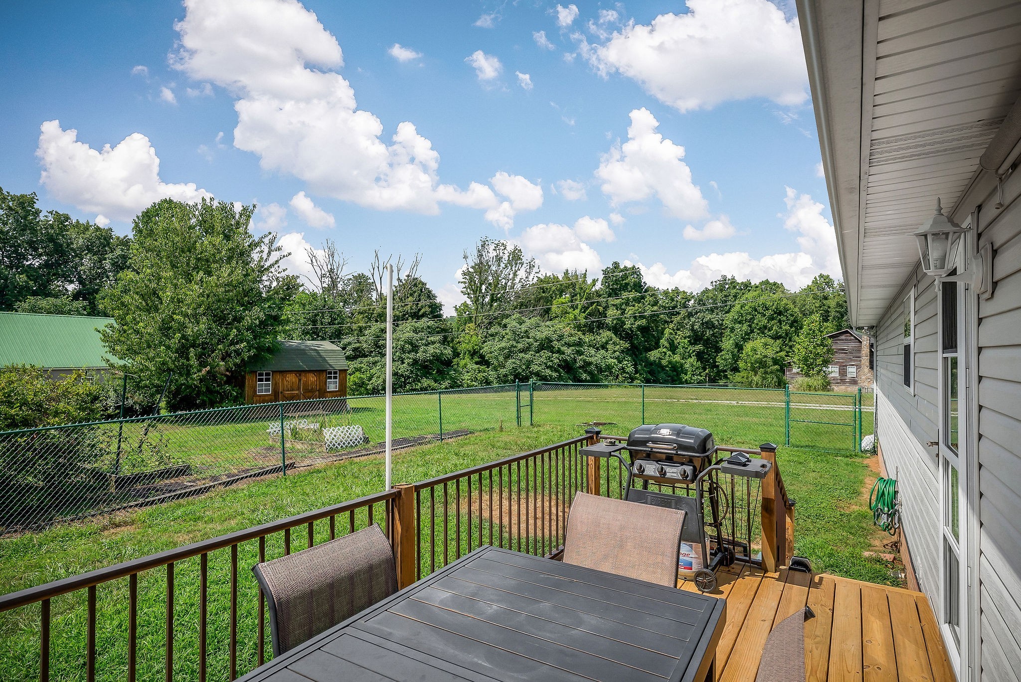 1565 Canada Flatt Road Cookeville, TN 38506 - Photo 22 of 28 a view of a deck with a yard