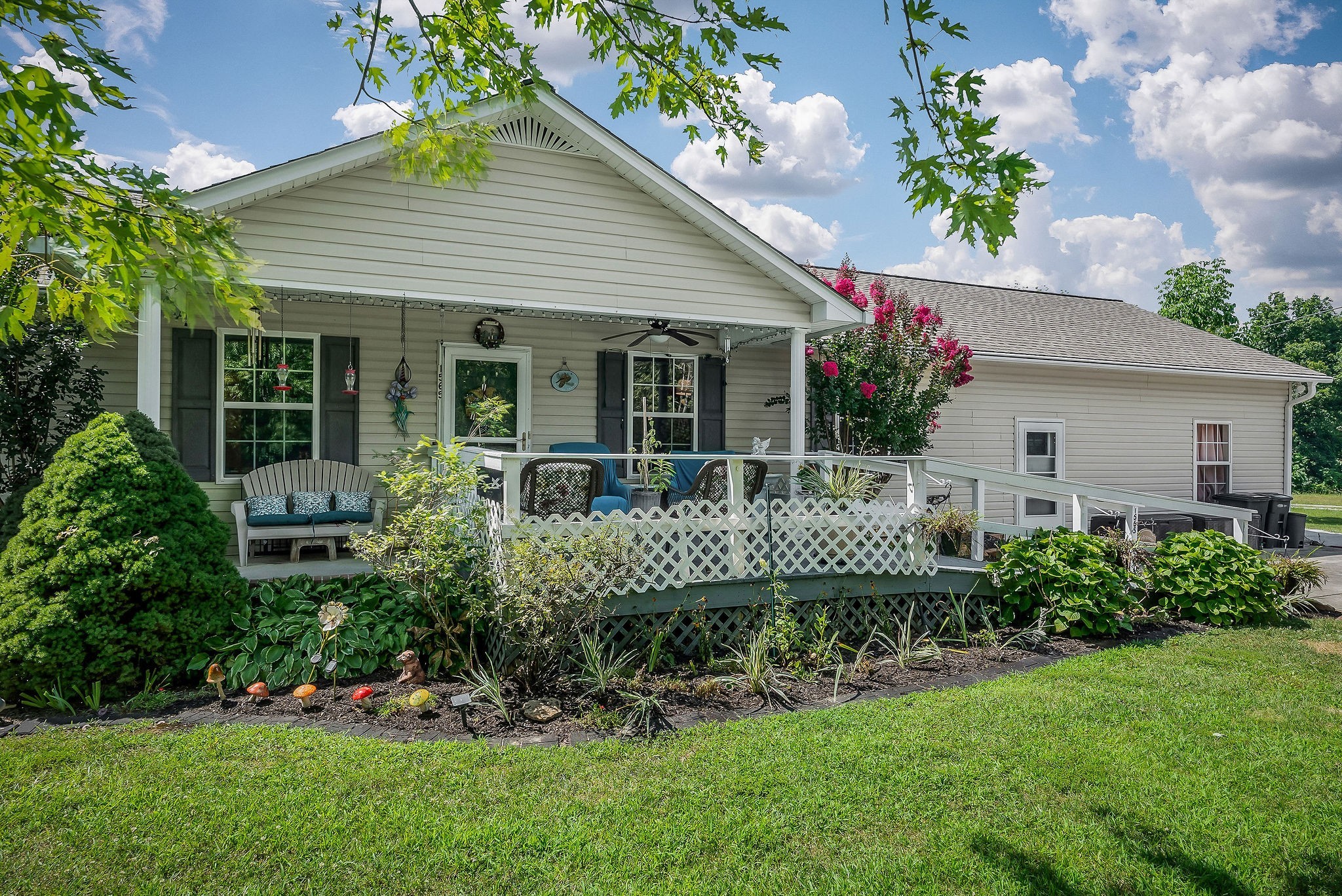 1565 Canada Flatt Road Cookeville, TN 38506 - Photo 26 of 28 a front view of a house with a garden