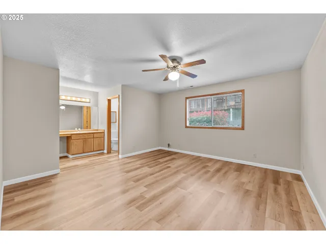 a view of a bathroom from a hallway