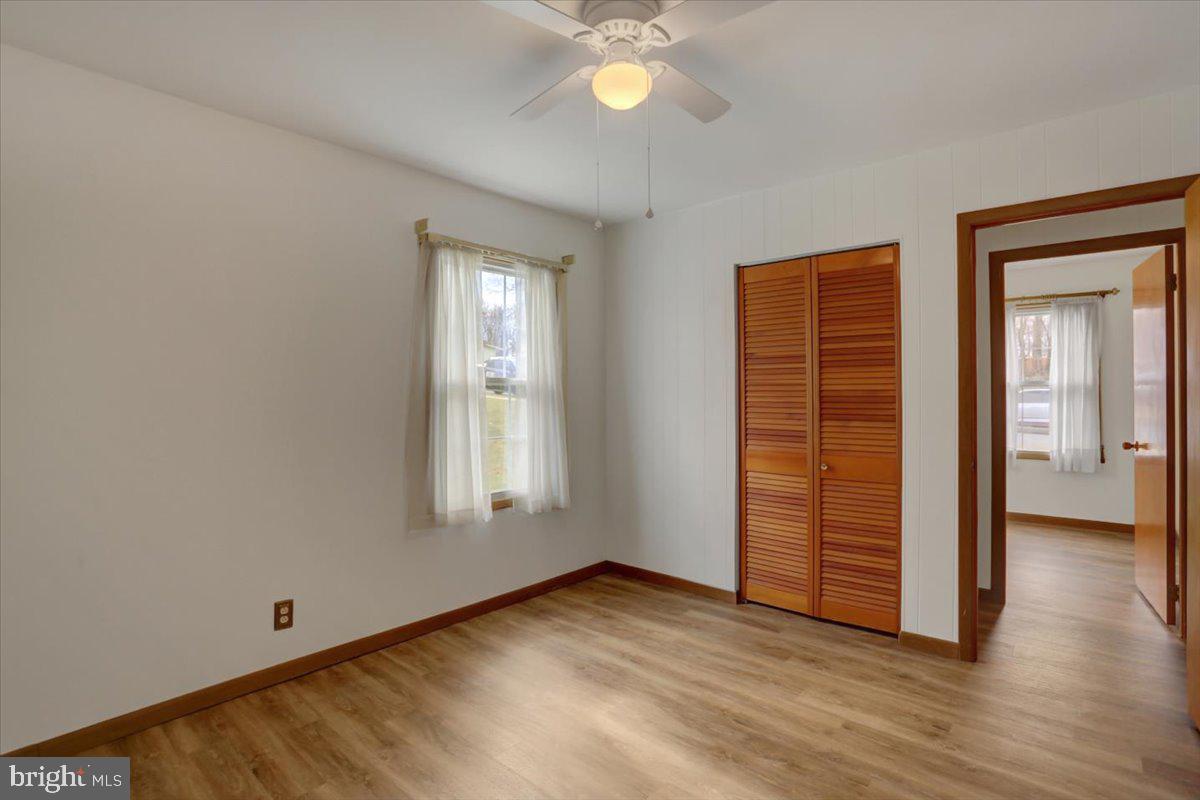 1130 Outer Drive Hagerstown, MD 21742 - Photo 16 of 37 an empty room with wooden floor and closet