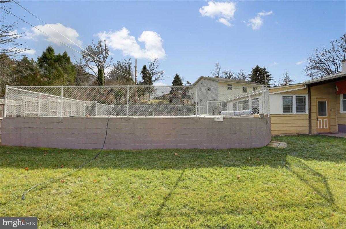 1130 Outer Drive Hagerstown, MD 21742 - Photo 31 of 37 a view of a house with a yard and potted plants