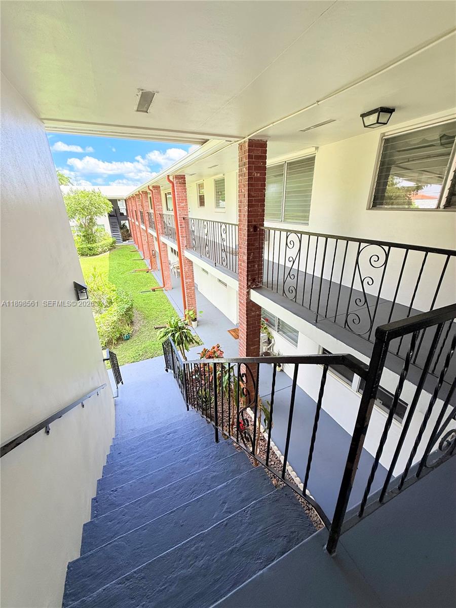 3600 Harrison Street, Unit 16B Hollywood, FL 33021 - Photo 26 of 34 a view of entryway with wooden floor