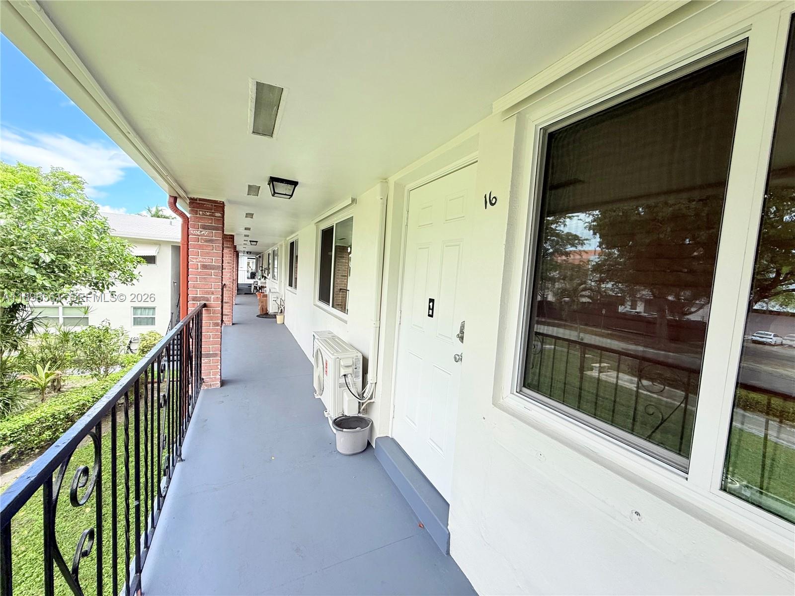 3600 Harrison Street, Unit 16B Hollywood, FL 33021 - Photo 31 of 34 a view of a porch
