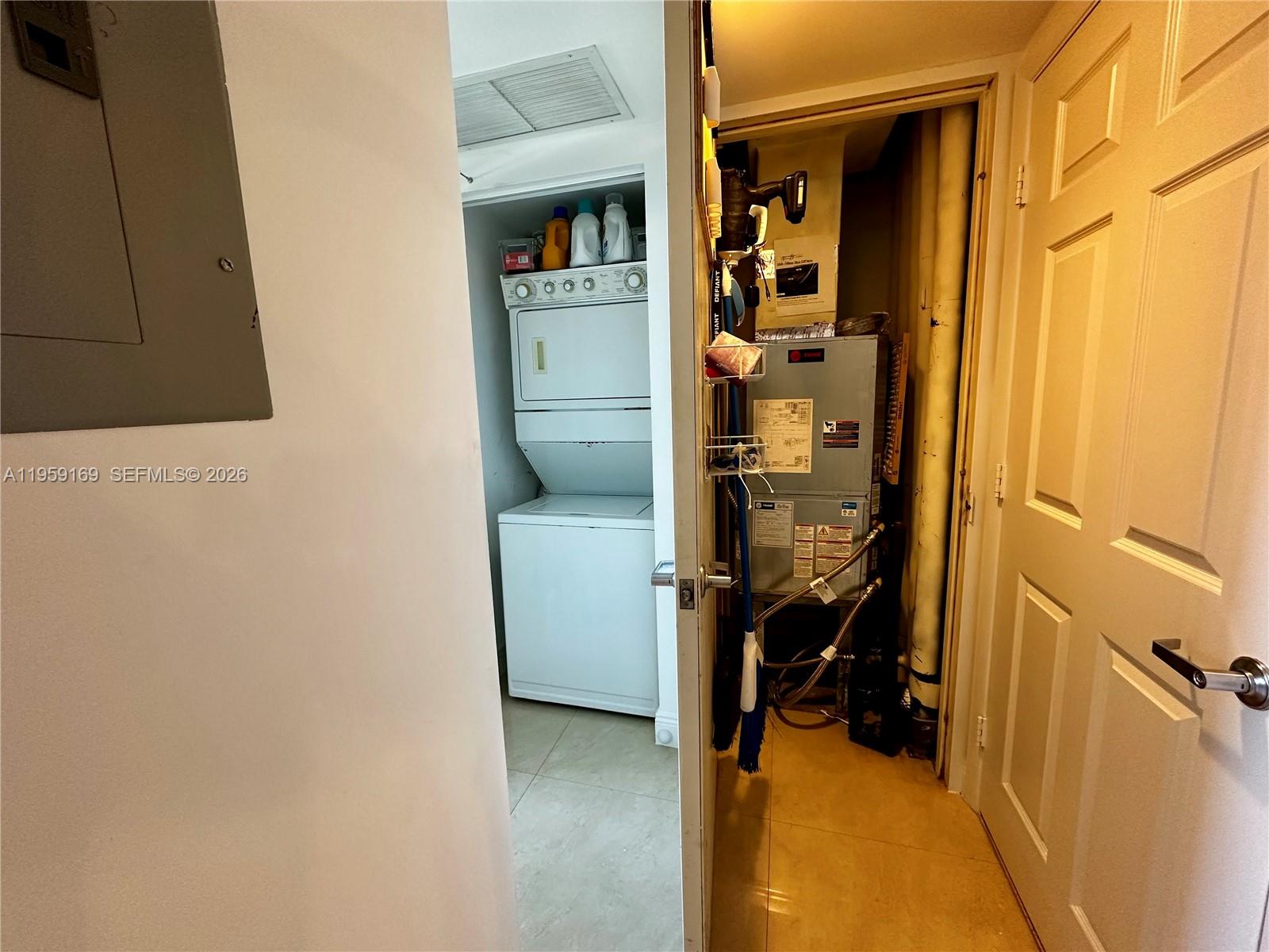 3232 Southwest 22nd Terrace, Unit 1604 Miami, FL 33145 - Photo 23 of 40 laundry &AC closet