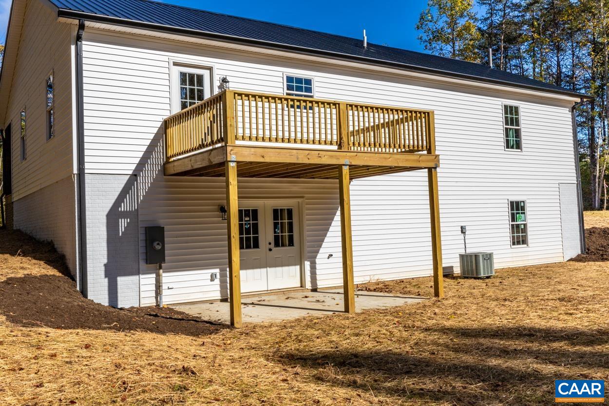 258 Twymans Mill Road Radiant, VA 22732 - Photo 11 of 59 a view of a house with a small yard and wooden fence