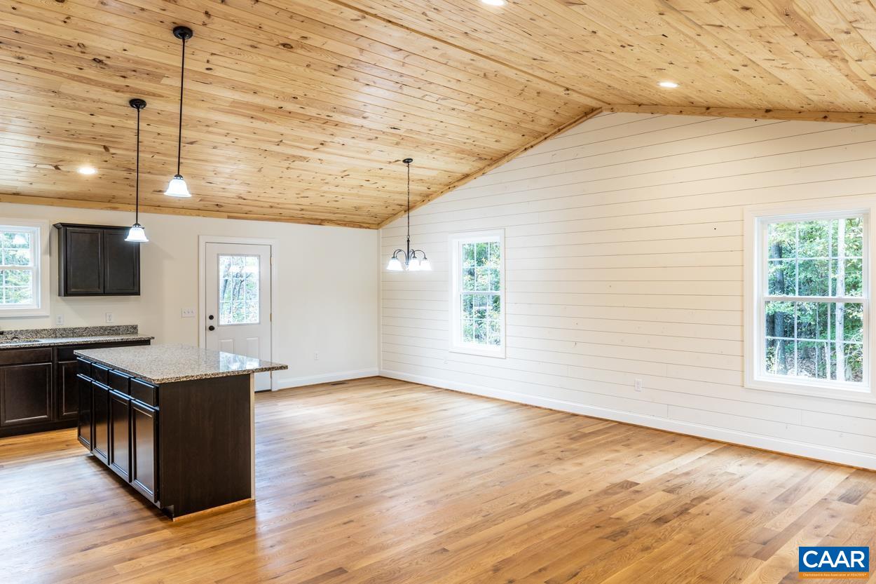 258 Twymans Mill Road Radiant, VA 22732 - Photo 15 of 59 a view of a kitchen with wooden floor and cabinets