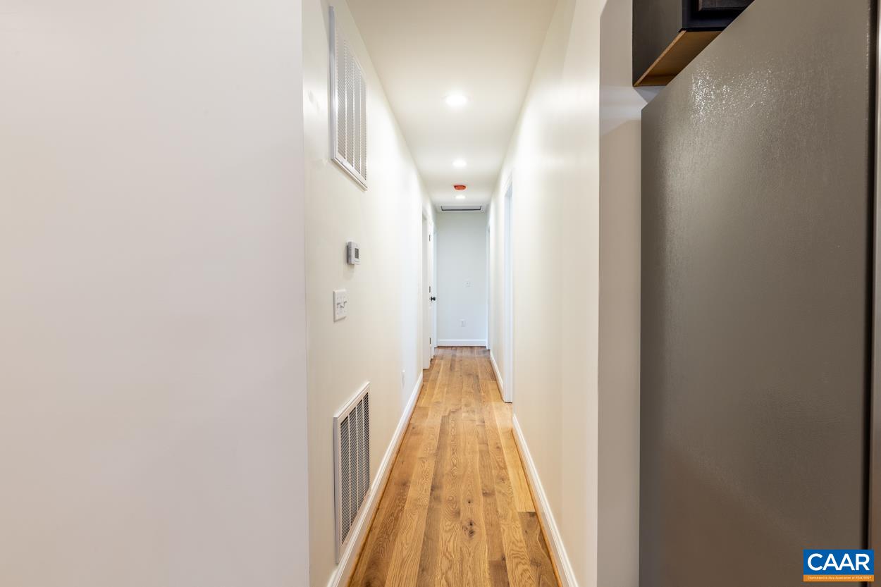 258 Twymans Mill Road Radiant, VA 22732 - Photo 25 of 59 a view of hallway with wooden floor