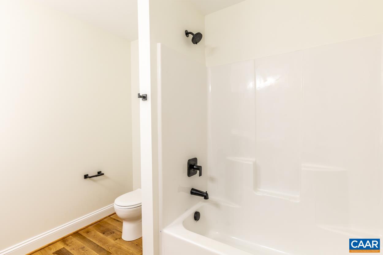 258 Twymans Mill Road Radiant, VA 22732 - Photo 34 of 59 a bathroom with a bathtub