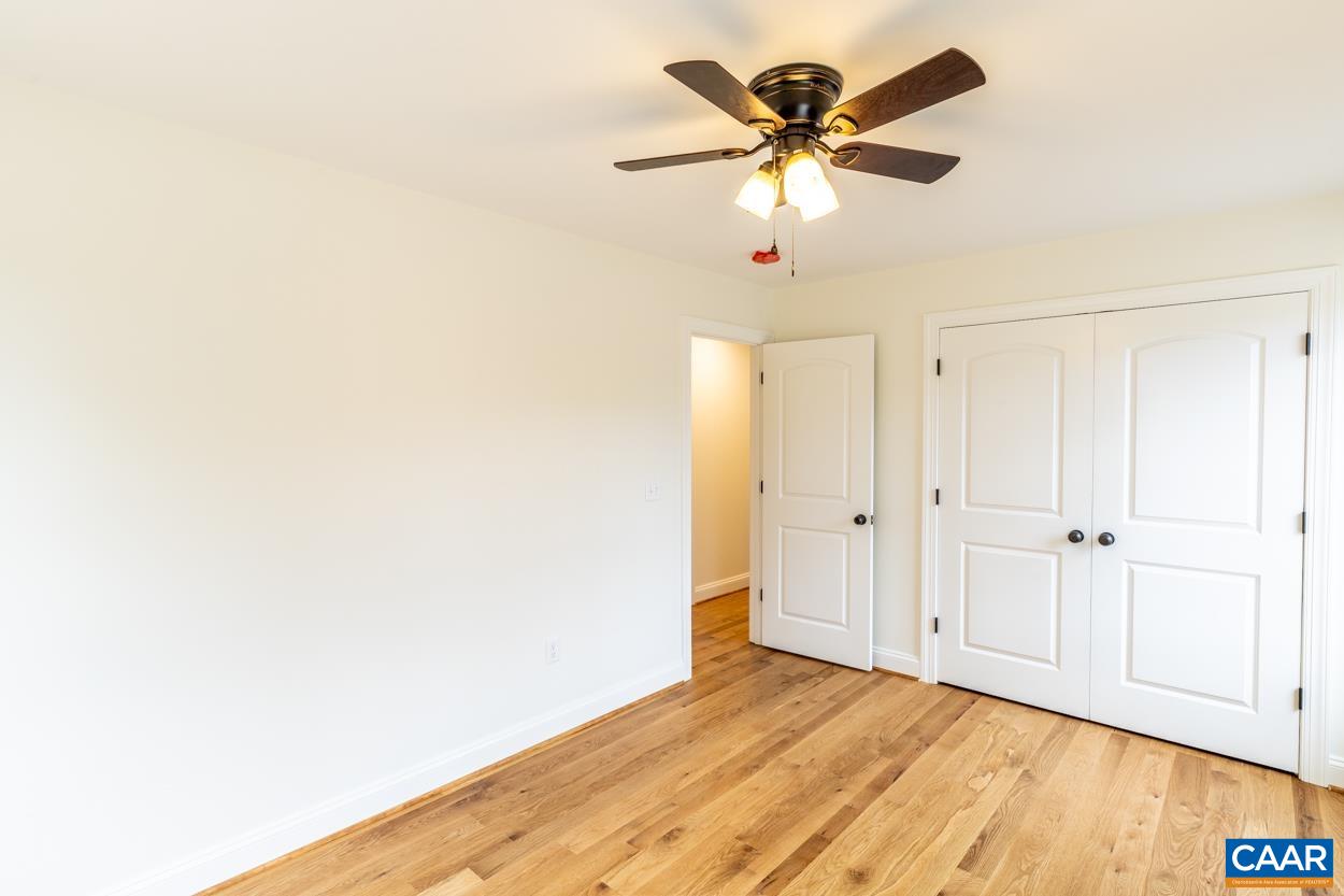 258 Twymans Mill Road Radiant, VA 22732 - Photo 37 of 59 a view of empty room with wooden floor