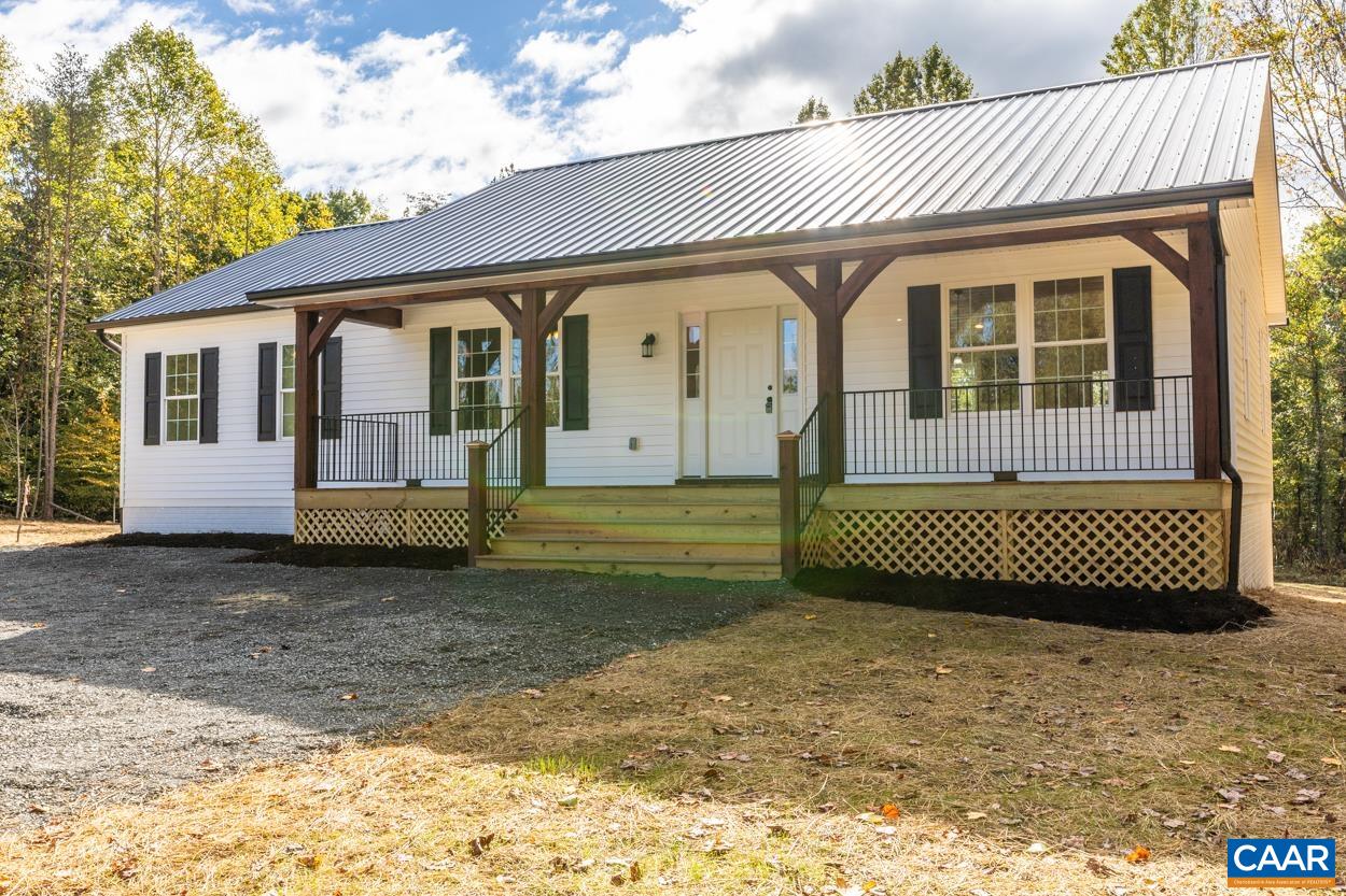 258 Twymans Mill Road Radiant, VA 22732 - Photo 4 of 59 a front view of a house with a garden