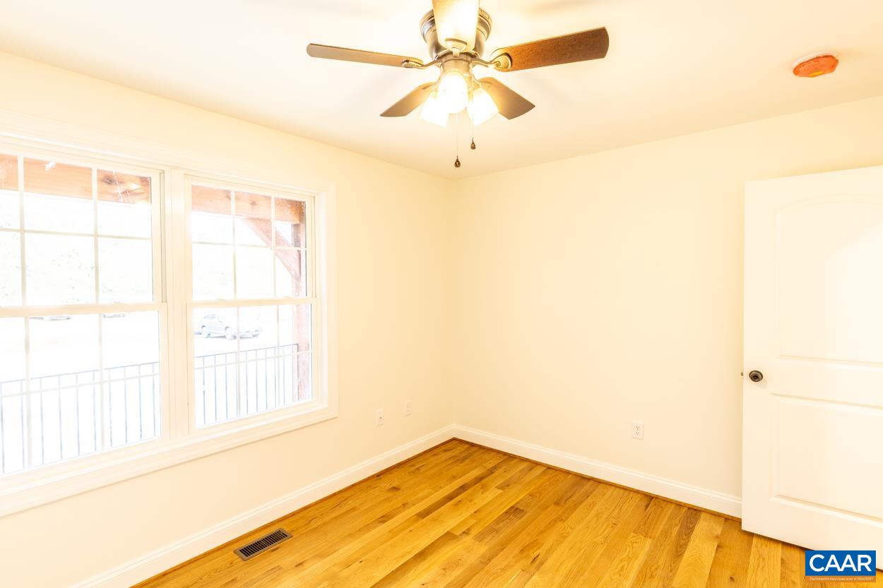 258 Twymans Mill Road Radiant, VA 22732 - Photo 43 of 59 a view of an empty room with a window