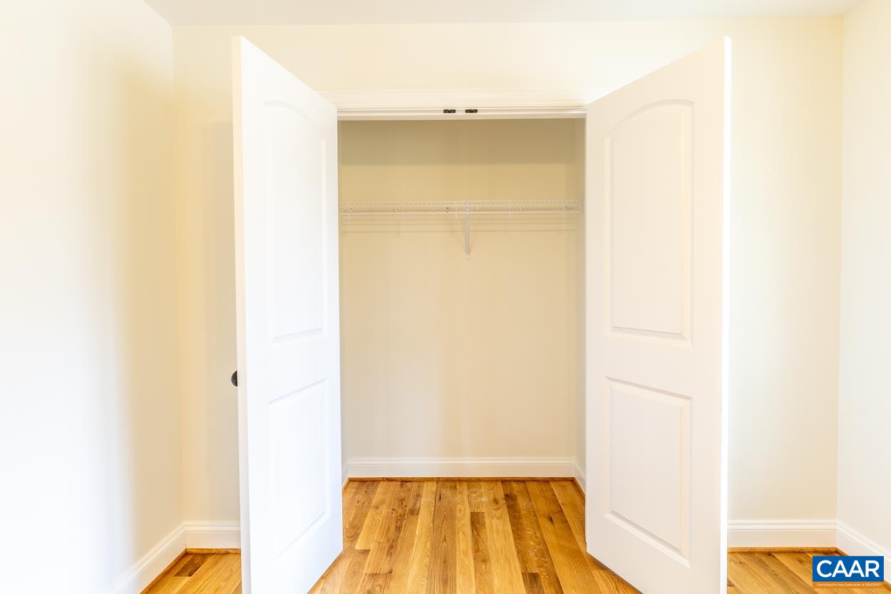 258 Twymans Mill Road Radiant, VA 22732 - Photo 44 of 59 a view of a room with wooden floor and a bathroom