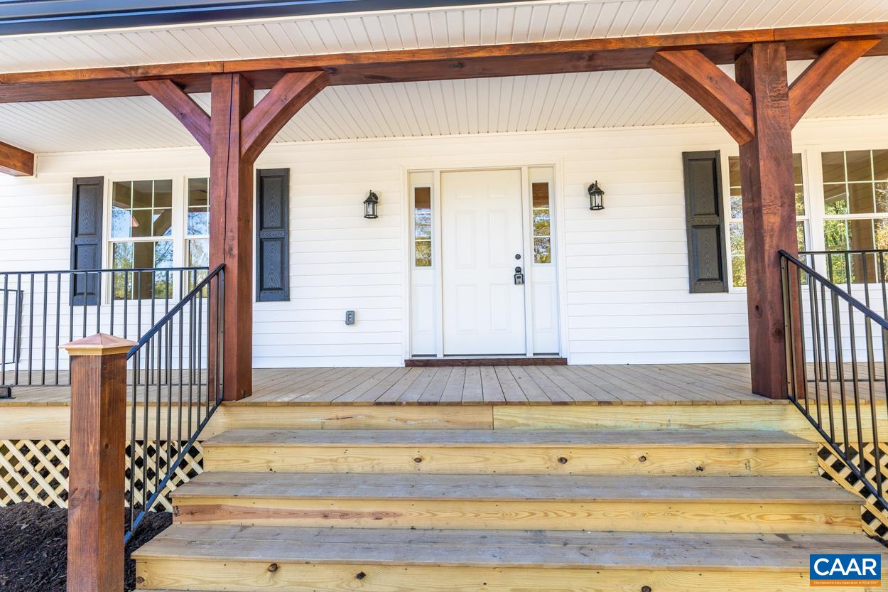 258 Twymans Mill Road Radiant, VA 22732 - Photo 6 of 59 a view of a entryway door of the house