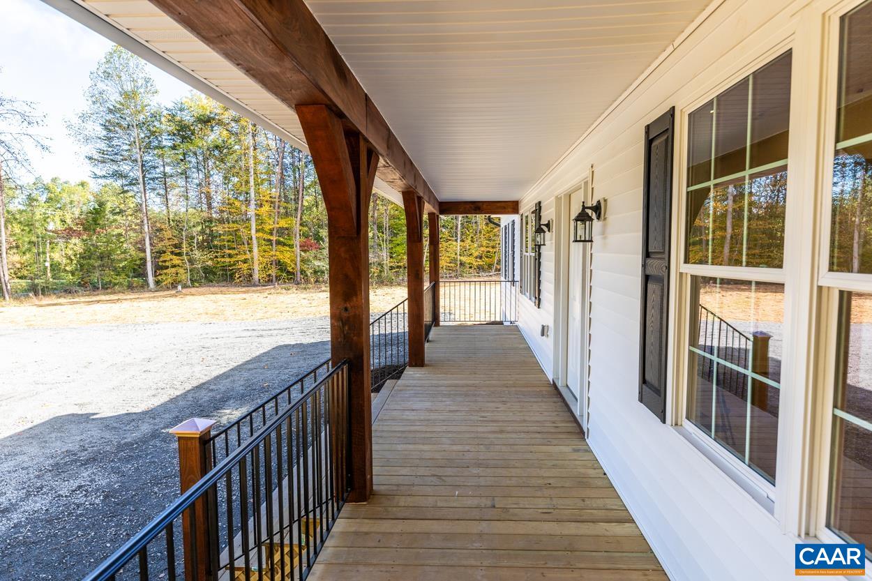 258 Twymans Mill Road Radiant, VA 22732 - Photo 7 of 59 a view of balcony with wooden floor