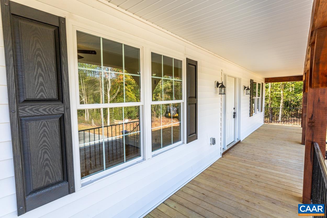 258 Twymans Mill Road Radiant, VA 22732 - Photo 8 of 59 a view of a balcony with wooden floor