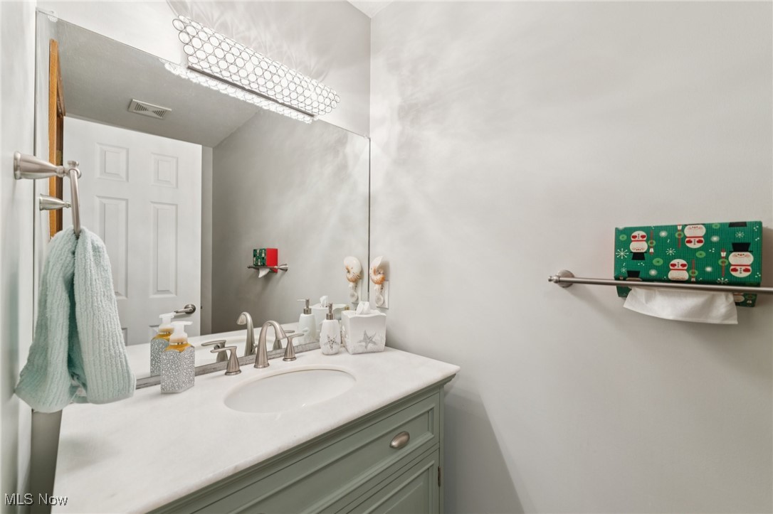 6930 Firestone Road Northeast Canton, OH 44721 - Photo 36 of 49 Bathroom with vanity