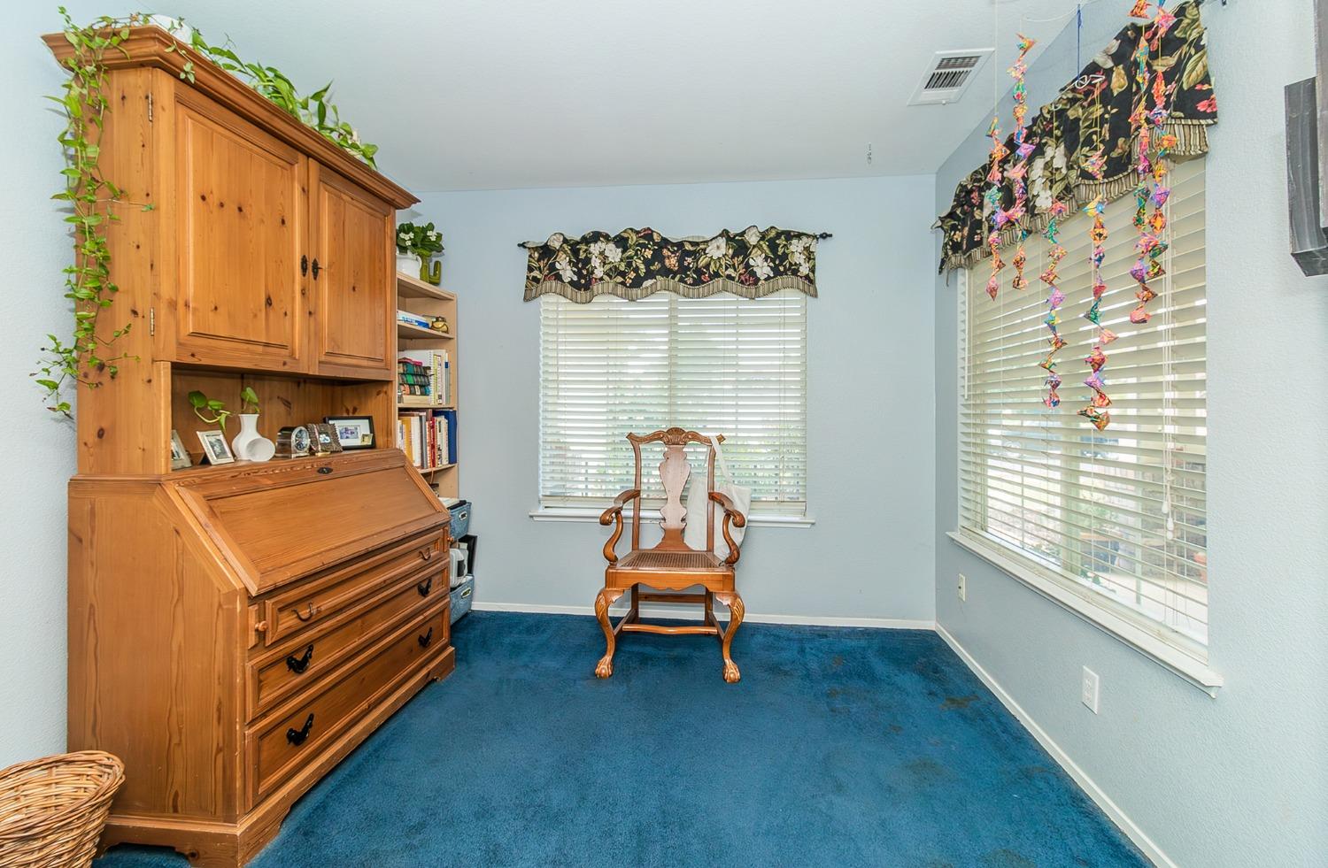 2831 Purvis Avenue Clovis, CA 93611 - Photo 11 of 26 a room with furniture and a window