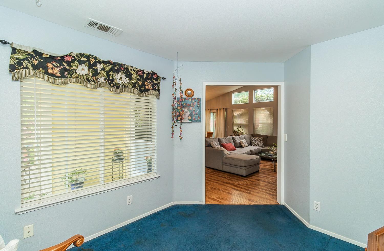 2831 Purvis Avenue Clovis, CA 93611 - Photo 12 of 26 a view of a bedroom with a couch