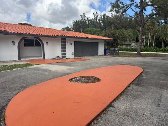 8421 Pioneer Road West Palm Beach, FL 33411 - Photo 1 of 18 FRONT DRIVE