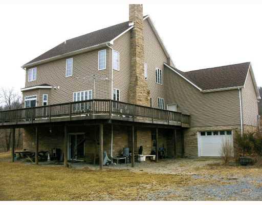 611 10 Mile Road Amity, PA 15311 - Photo 2 of 15 Exterior Back. PRIVATE DECK OVER LOOKING 27 ACRES