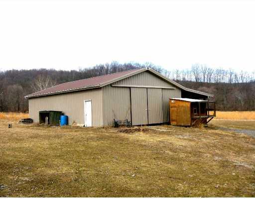 611 10 Mile Road Amity, PA 15311 - Photo 14 of 15 Land/Lot. LAND & GARDEN TOOL STORAGE BEHIND HOME