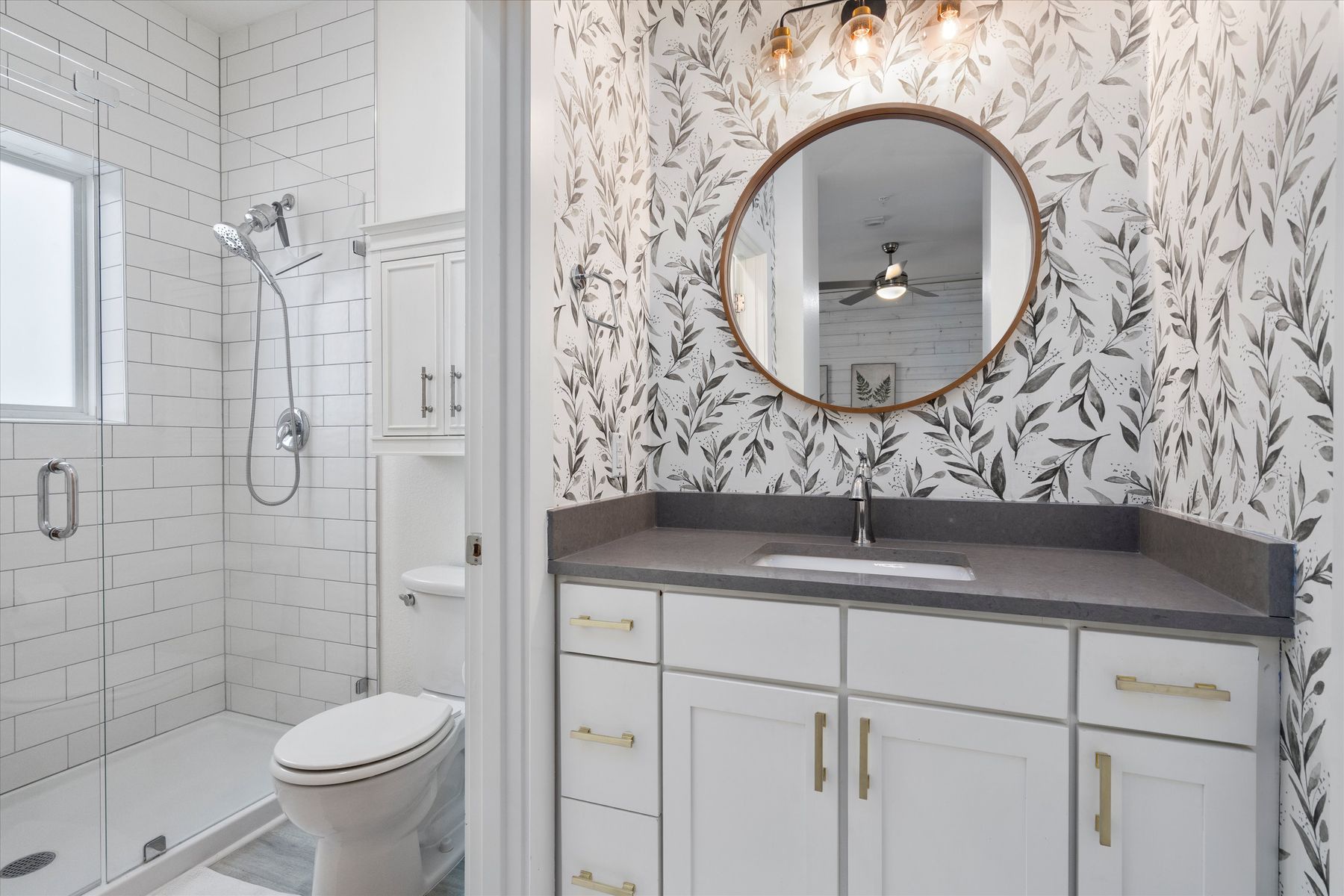 2827 Manor Road, Unit 3102 Austin, TX 78722 - Photo 12 of 20 a bathroom with a sink and a mirror