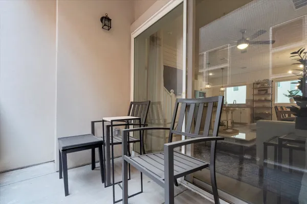 a view of kitchen with furniture and a window