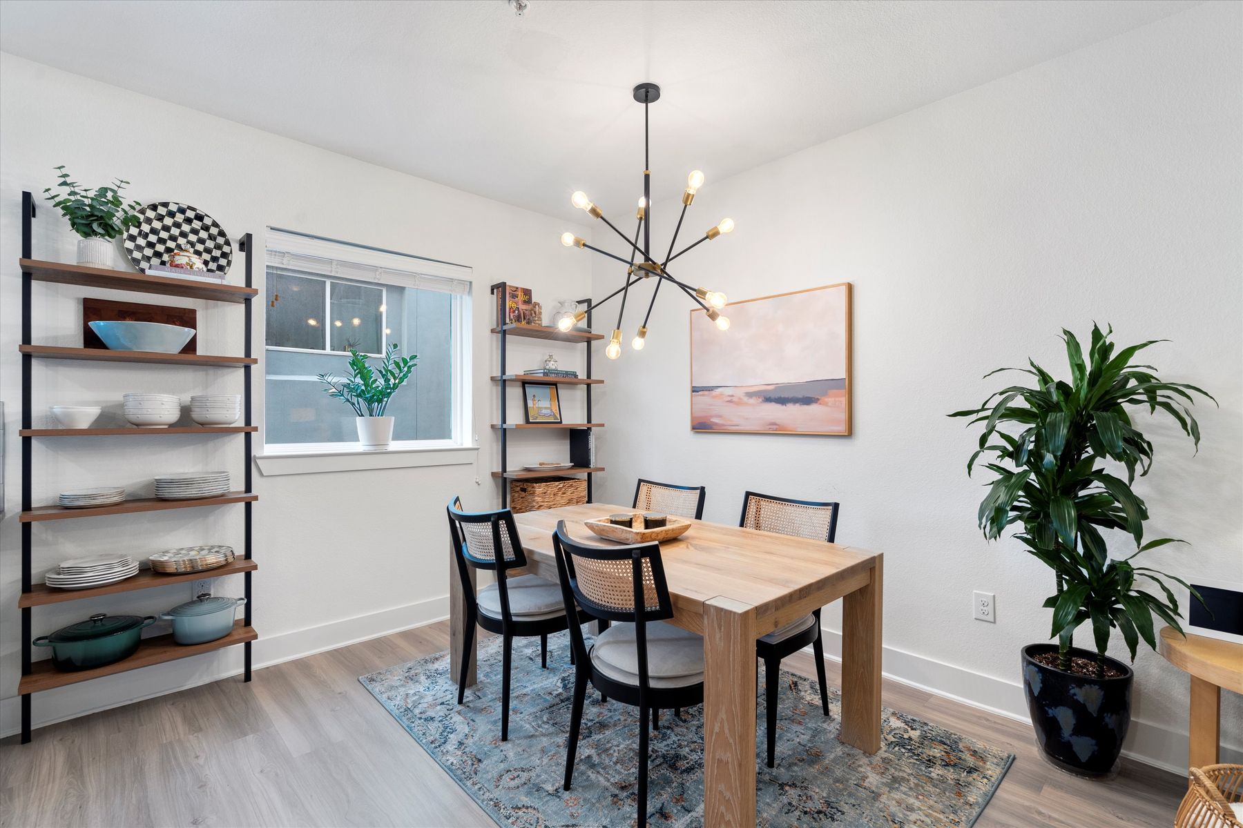 2827 Manor Road, Unit 3102 Austin, TX 78722 - Photo 2 of 20 a dining room with furniture and window