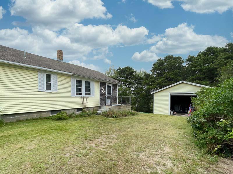 139 Shore Road Truro, MA 02666 - Photo 11 of 30 a front view of a house with yard