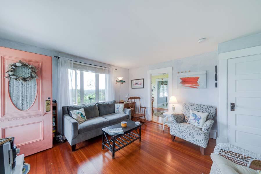 139 Shore Road Truro, MA 02666 - Photo 16 of 30 a living room with furniture and a window
