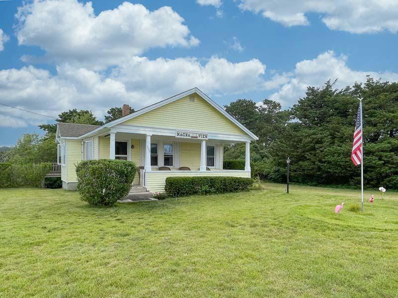 139 Shore Road Truro, MA 02666 - Photo 2 of 30 a view of a house with backyard and garden