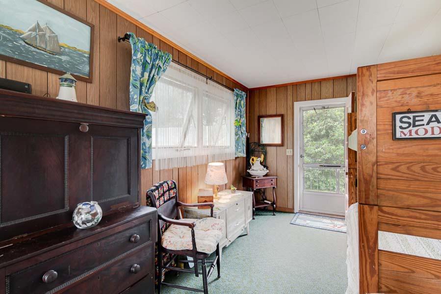 139 Shore Road Truro, MA 02666 - Photo 28 of 30 a living room with furniture and a window