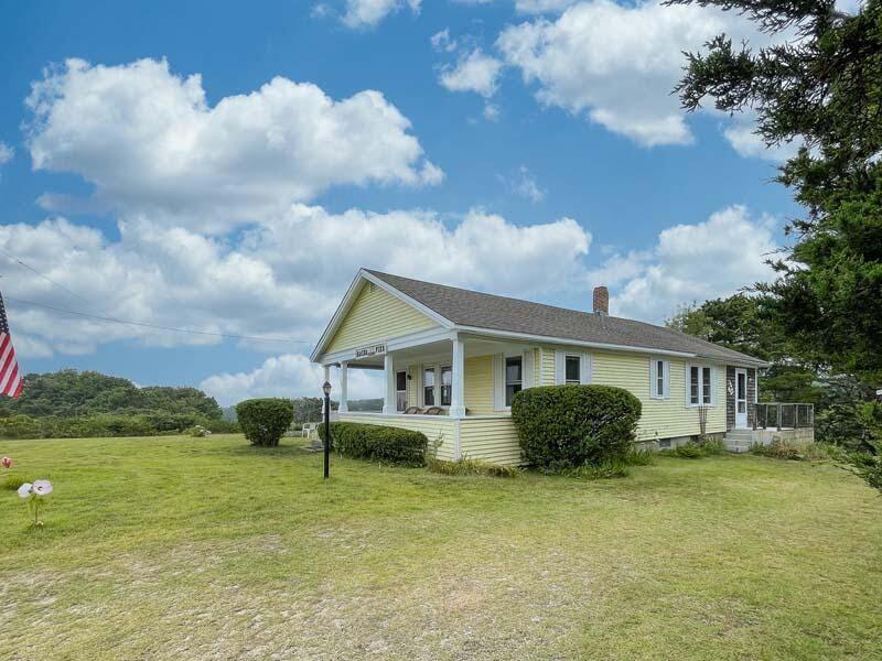 139 Shore Road Truro, MA 02666 - Photo 3 of 30 a view of a house with a backyard