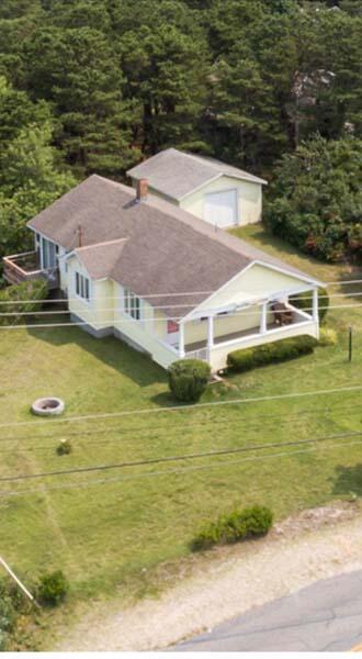 139 Shore Road Truro, MA 02666 - Photo 4 of 30 a aerial view of residential houses with outdoor space
