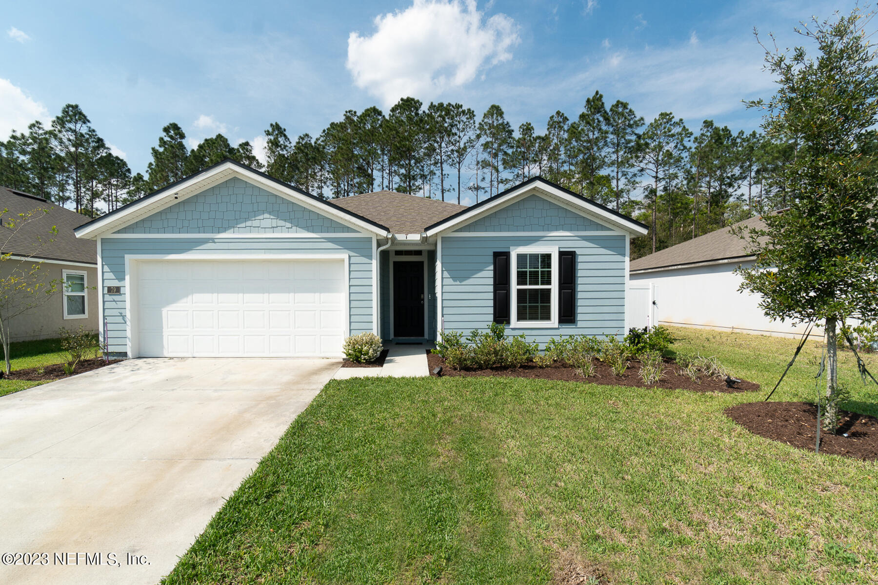 79 Rivertown Road Palm Coast, FL 32137 - Photo 1 of 29 Ext Front a